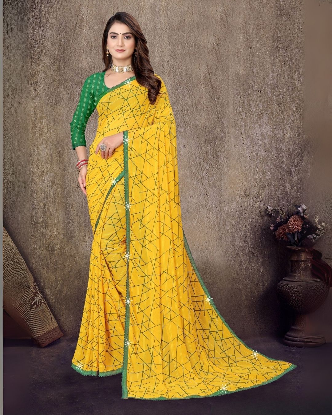 Kesari patterned printed regular wear yellow saree